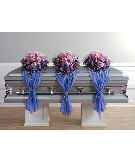 Casket Spray on Fabric Drape