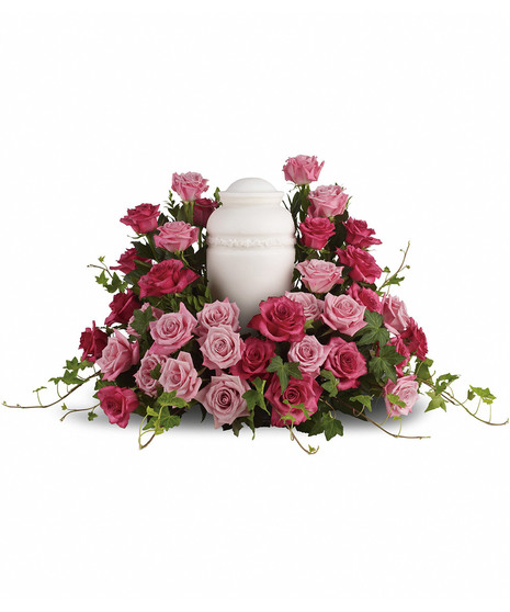 A wealth of shades of pink roses create a soft, serene and dignified arrangement to sit around the urn (urn not included only shown for display)