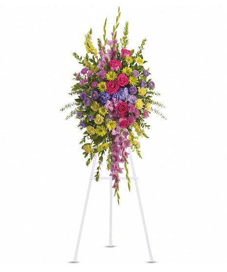  gladioli and cushion spray chrysanthemums, snapdragons, carnations and daisy spray chrysanthemums, roses, hydrangea, asters and assorted greens.