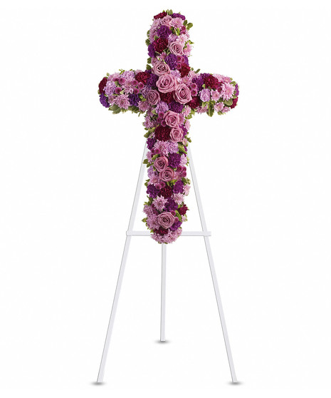 cross with lavender and purple carnations,roses, cushions mums,daisy, stock