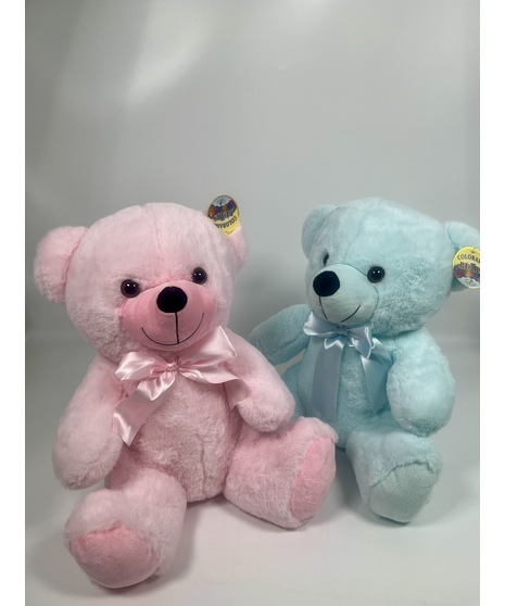 a sitting bear in your choice of white brown or tan with a red ribbon on the neck