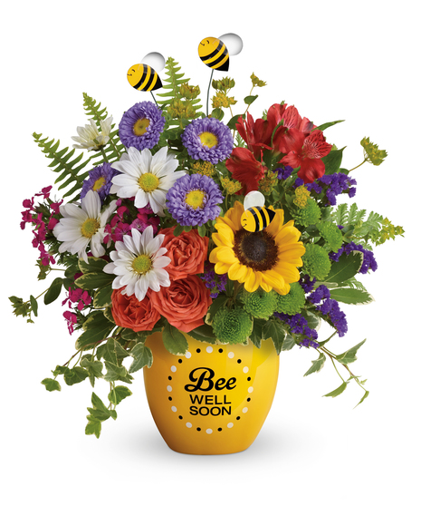 yellow ceramic pot reads 