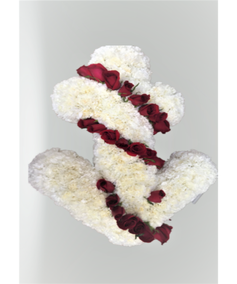 an anchor made with white mums and red roses circling the anchor to represent the ropes, a tribute for the sea farer