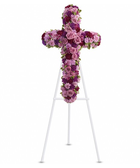 cross with lavender and purple carnations,roses, cushions mums,daisy, stock