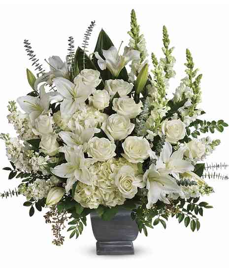 white hydrangeas, liies, roses, snapdragons in slate fiberglass rectangle shape container with spiral eucalyptus, emerald, jade and salal 