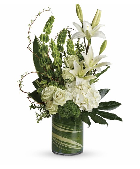 modern bouquet has white hydrangea, lilies, green roses, dianthus, bells of Ireland, button  curly willow, oregonia, aspidistra, aralia ti leaf, in leaf lines cylinder