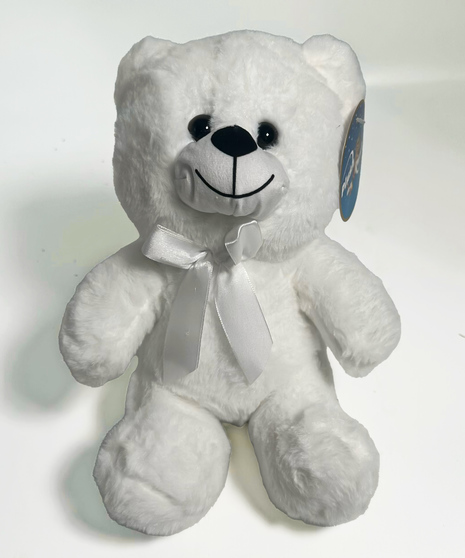 a sitting bear in your choice of white brown or tan with a red ribbon on the neck